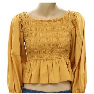 FREE PEOPLE mustard peplum smocked top